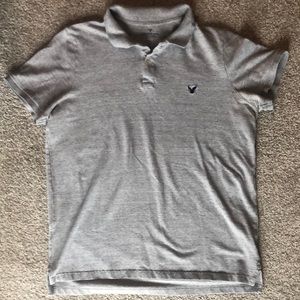 Men’s light grey & navy blue American Eagle brand “Core Flex” polo shirt. Size L